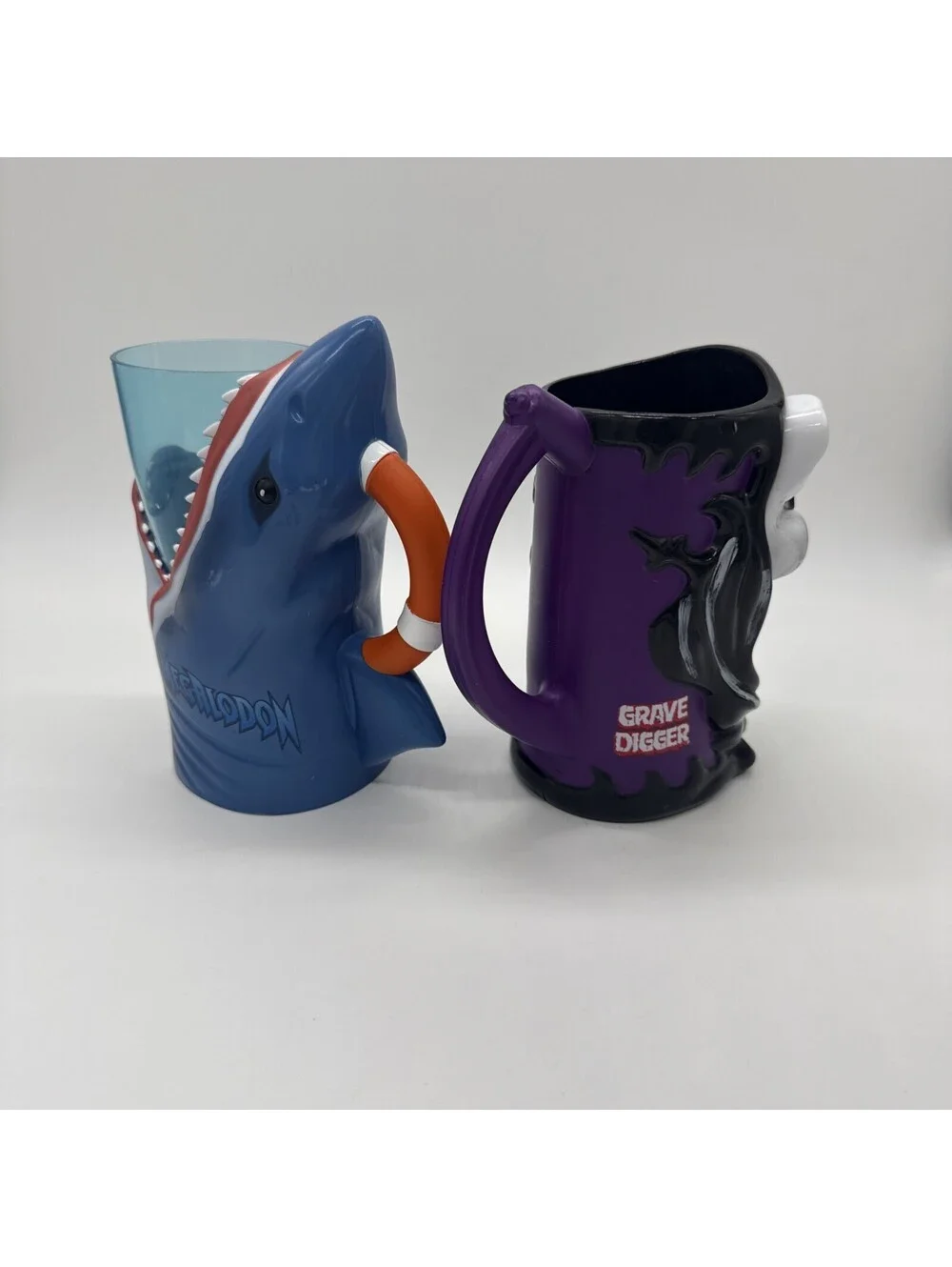 Monster Jam Megalodon Shark & Grave Digger Skull Light Up Cups They Do Not Work